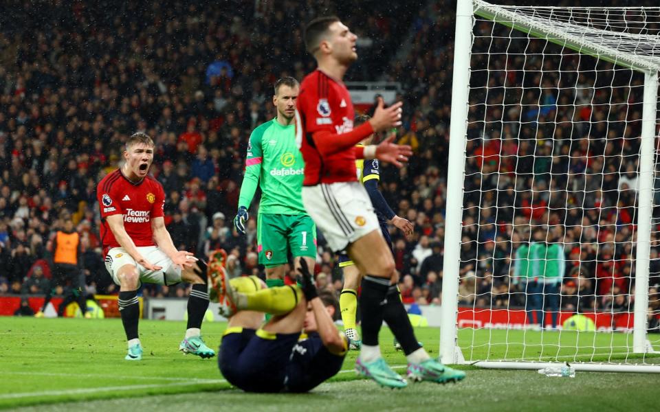 Rasmus Hojlund (left) vents his frustration at Diogo Dalot