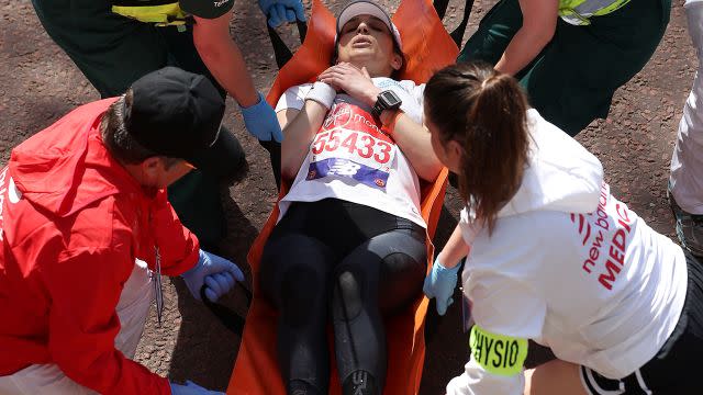 Some runners had to be taken away on stretchers. Image: AFP