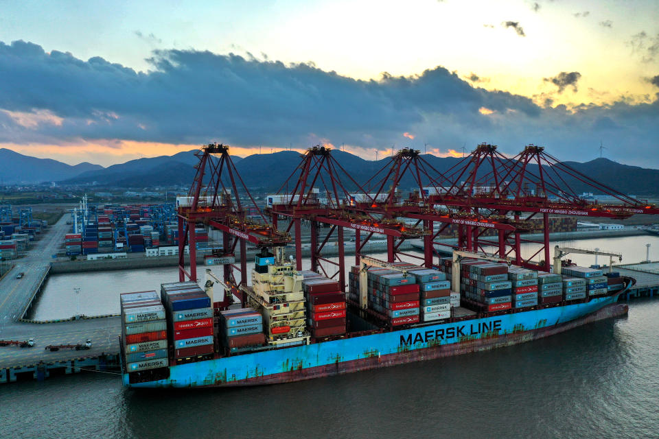 ZHOUSHAN, CHINA - OCTOBER 04: Containers are unloaded from a cargo ship of Maersk Line at Zhoushan port on October 4, 2021 in Zhoushan, Zhejiang Province of China. (Photo by Yao Feng/VCG via Getty Images)