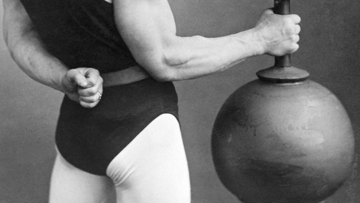 eugen sandow lifting large barbell circa 1895