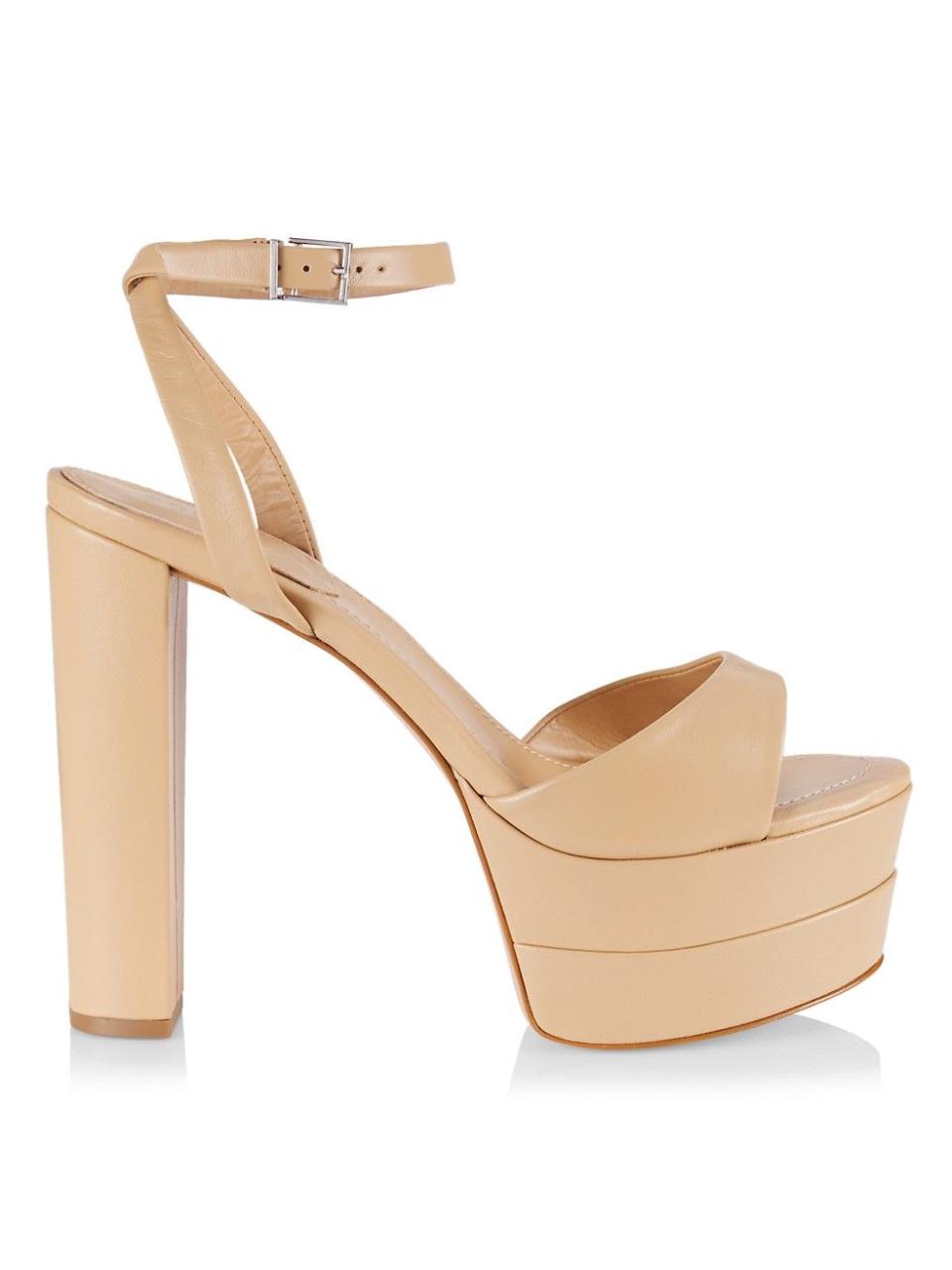 <p><strong>Schutz</strong></p><p>saksfifthavenue.com</p><p><strong>$148.00</strong></p><p>You can't go wrong with a neutral shoe paired with a double dose of a platform.</p>