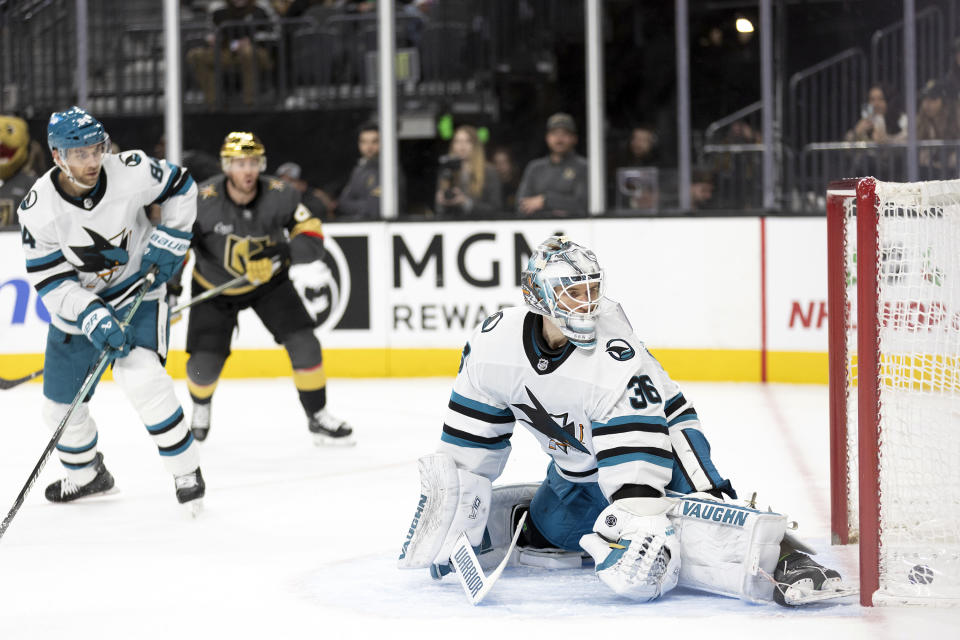 San Jose Sharks goaltender Kaapo Kahkonen (36) misses a save against a goal by Vegas Golden Knights center Chandler Stephenson (not shown) during the second period of an NHL hockey game Sunday, Dec. 10, 2023, in Las Vegas. (AP Photo/Ellen Schmidt)