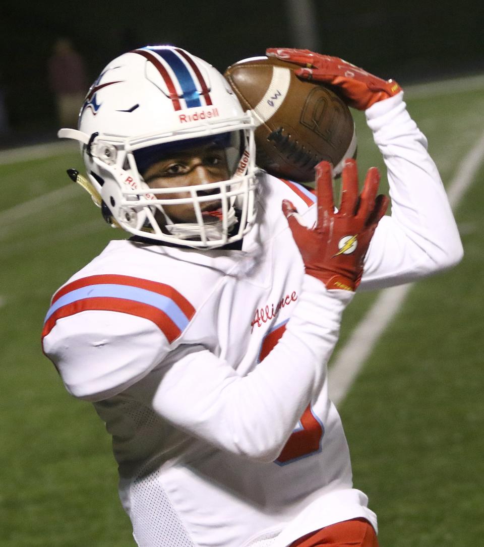 Alliance's Ramhir Hawkins pulled in this long pass from Brendan Zurbrugg before scoring a touchdown at Carrollton, Sept. 30, 2022.