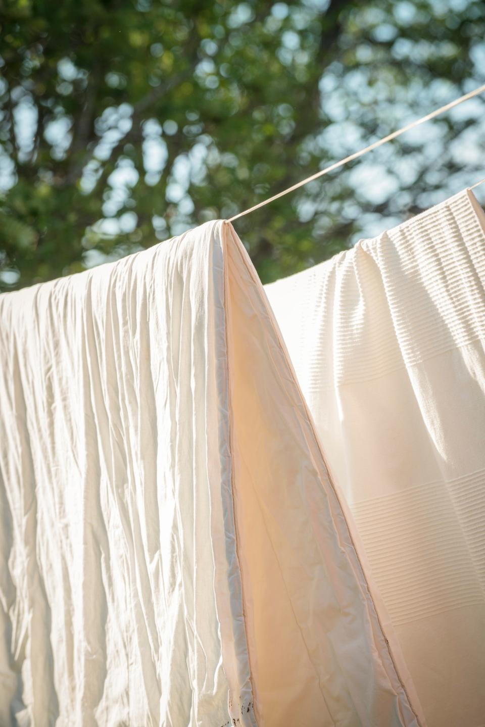 To keep your colored sheets from fading, choose a lower heat setting on your dryer or consider hanging them up to dry.