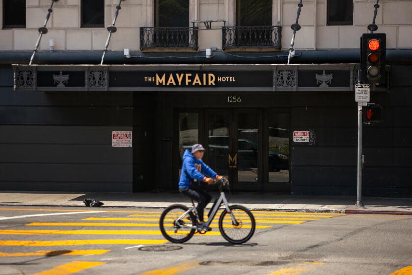 Los Angeles, CA - May 07: The Mayfair Hotel, a 15-story hotel in Westlake/MacArthur Park, Mayor Karen Bass' team is in talks to purchase to use as interim homeless housing on Sunday, May 7, 2023 in Los Angeles, CA. (Jason Armond / Los Angeles Times)