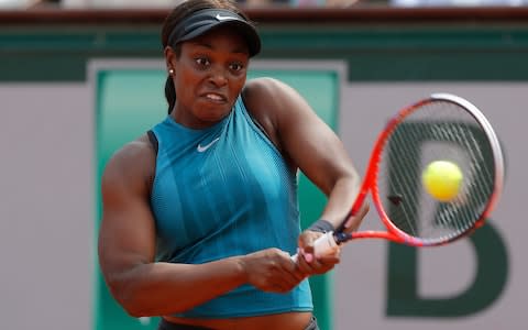 Sloane Stephens, of the United States, returns a shot against Romania's Simona Halep in the finals of the French Open tennis tournament at the Roland Garros stadium in Paris, France. - Credit: AP