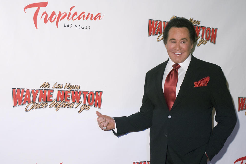 FILE - Wayne Newton poses on the red carpet for the grand opening of his new Las Vegas show, Once Before I Go, Wednesday, Oct. 28, 2009 at The Tropicana Hotel and Casino. (AP Photo/Eric Jamison, File)