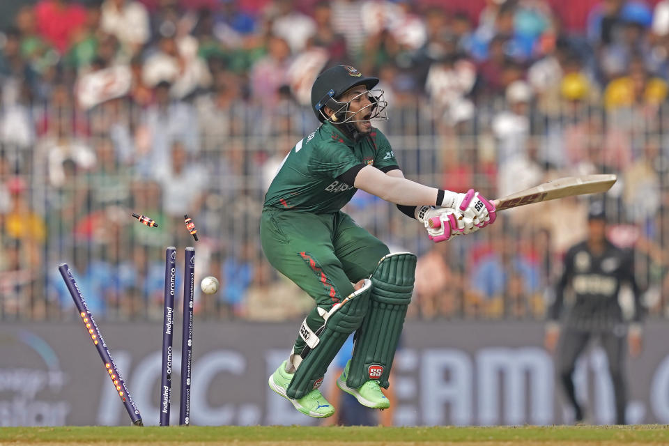 Bangladesh's Mushfiqur Rahim is bowled out by New Zealand's Matt Henry during the ICC Men's Cricket World Cup match between New Zealand and Bangladesh in Chennai , India, Friday, Oct. 13, 2023. (AP Photo/Eranga Jayawardena)