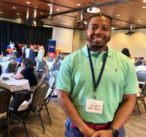  Kyle Bland owns a North Omaha barber shop wants to delve into real estate development. He said he hopes to improve not only the look of his customers, but his broader neighborhood. (Cindy Gonzalez/Nebraska Examiner)