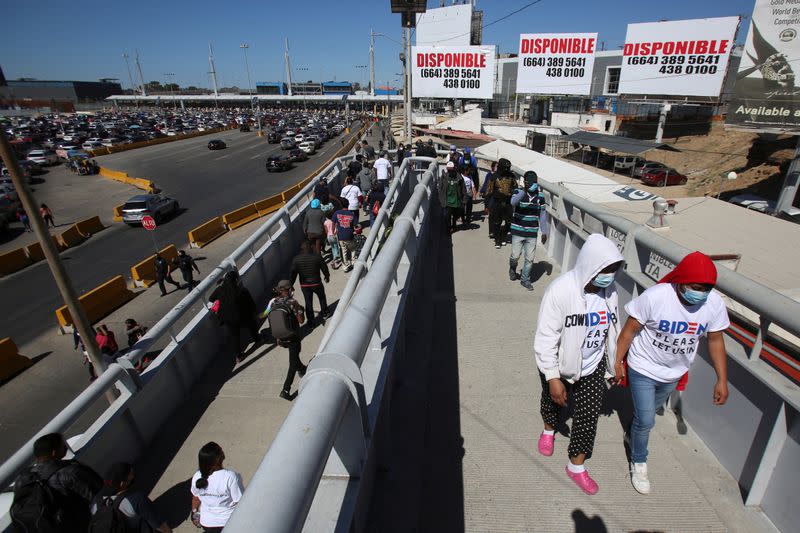 Migrants protest at the Mexico-U.S. San Ysidro point of entry in Tijuana