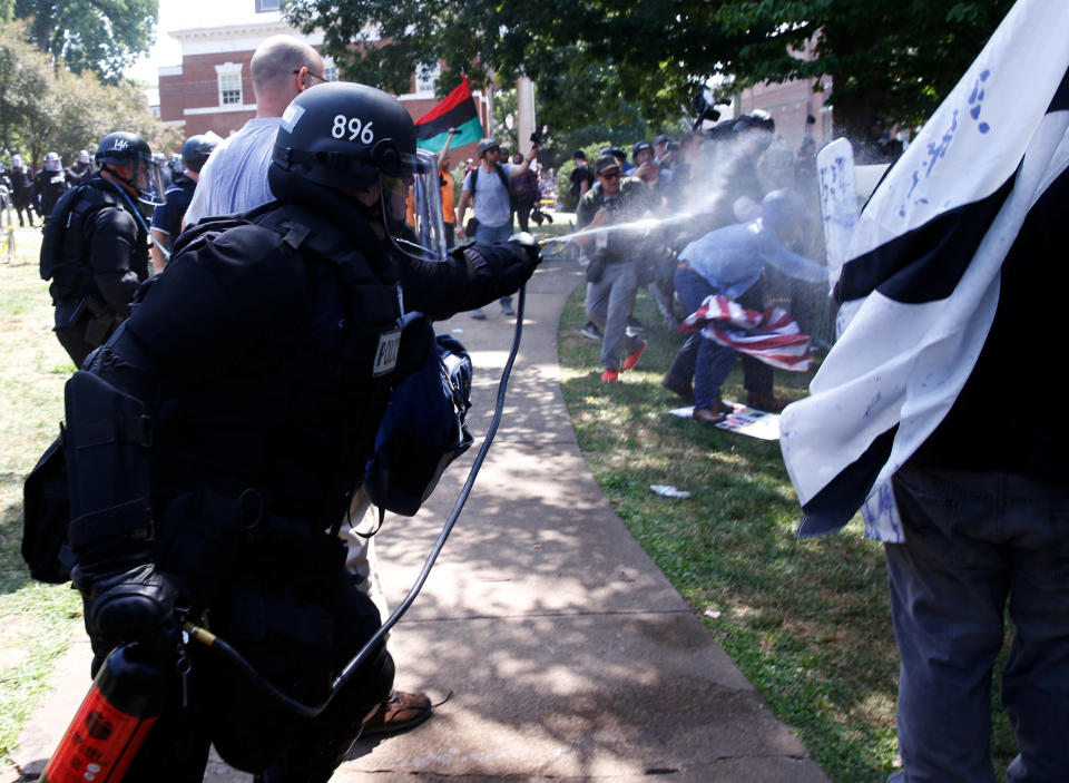 Virginia State Police use pepper spray as they move in during a&nbsp;clash between white nationalist protesters&nbsp;and counter-protesters.
