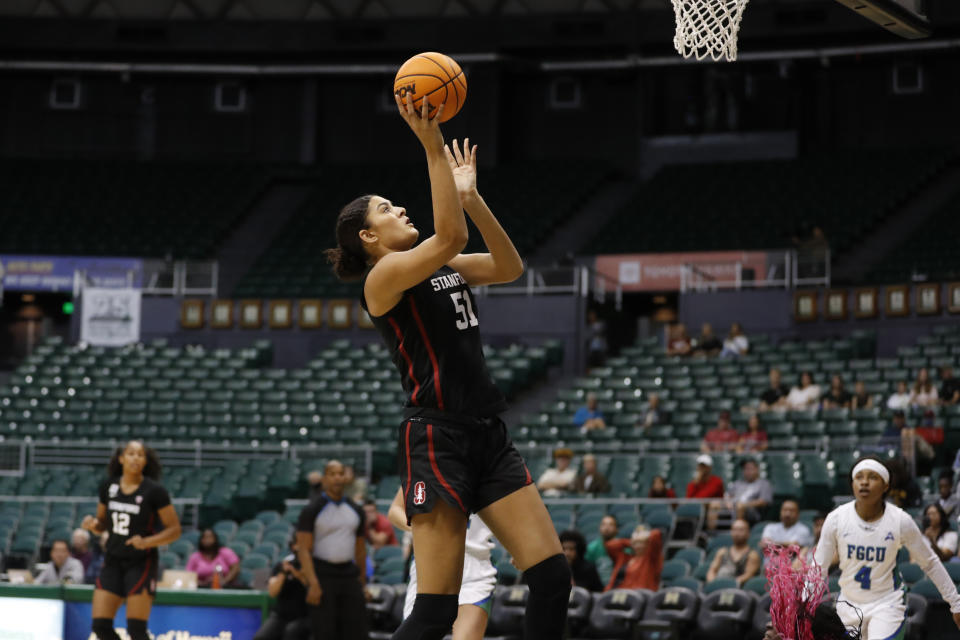 Stanford center Lauren Betts (51) goes up for a layup over Florida Gulf Coast during the first quarter of an NCAA college basketball game, Friday, Nov. 25, 2022, in Honolulu. (AP Photo/Marco Garcia)