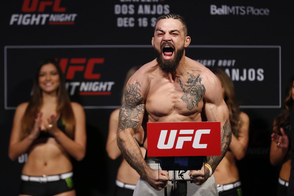 Welterweight Mike Perry weighs in prior to his bout against Santiago Ponzinibbio on Saturday at the UFC Fight Night event in Winnipeg, Manitoba, Friday, Dec. 15, 2017. (AP)