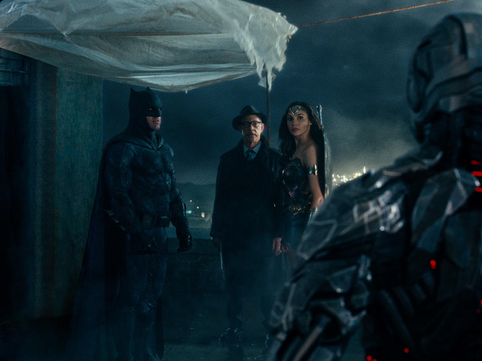 Batman (Ben Affleck), Jim Gordon (JK Simmons), Wonder Woman (Gal Gadot) facing Cyborg (Ray Fisher) in Zack Snyder's Justice League (Warner Bros)