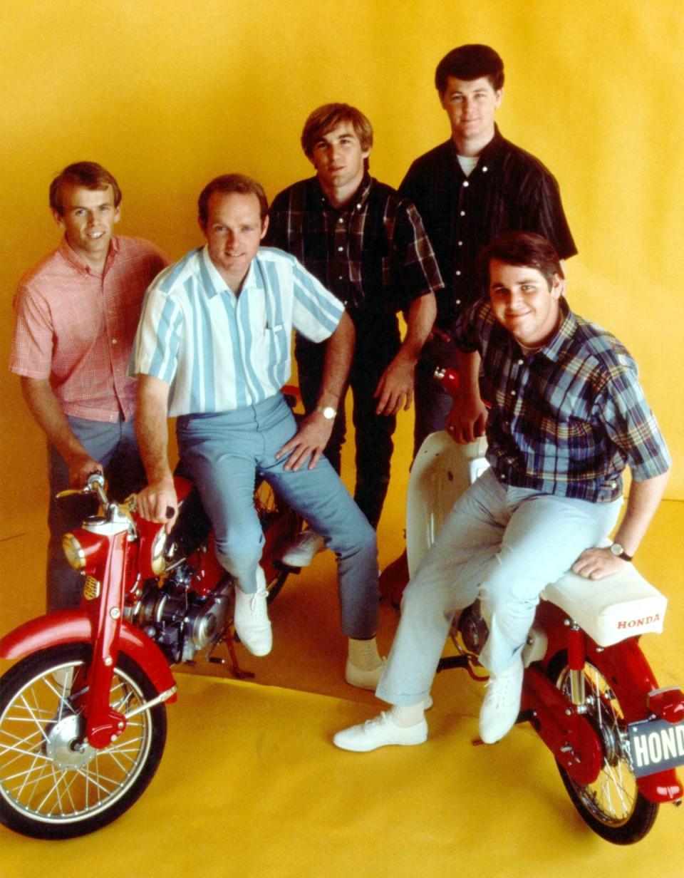 The Beach Boys pose for a portrait, circa 1964 in Los Angeles. From left: Al Jardine, Mike Love, Dennis Wilson, Brian Wilson, Carl Wilson. Disney (Photo by Michael Ochs Archives/Getty Images)