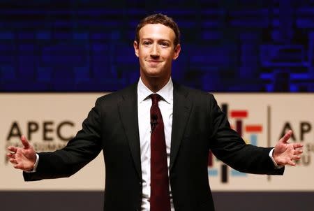 Facebook CEO Mark Zuckerberg gestures while addressing the audience during a meeting of the APEC (Asia-Pacific Economic Cooperation) Ceo Summit in Lima, Peru, November 19, 2016. REUTERS/Mariana Bazo