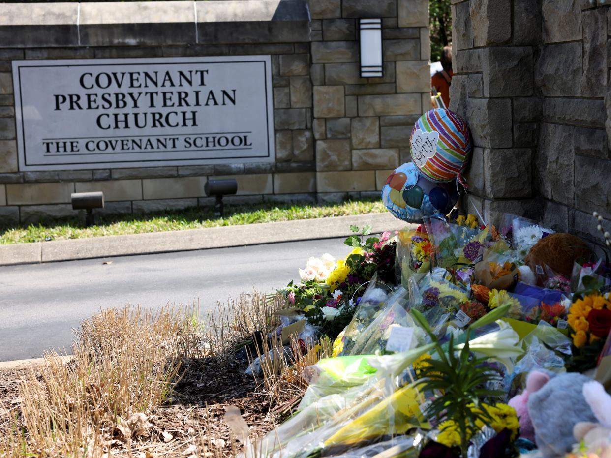 View of a memorial for the fallen at the school entrance after a deadly shooting at the Covenant School in Nashville, Tennessee, on March 28, 2023.