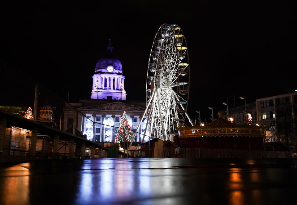An empty Christmas market on a quiet evening in Nottingham city centre. (Photo by Zac Goodwin/PA Images via Getty Images)