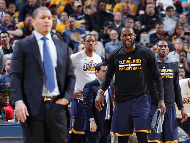 LeBron James looks on as another blowout spins away. (Getty Images)