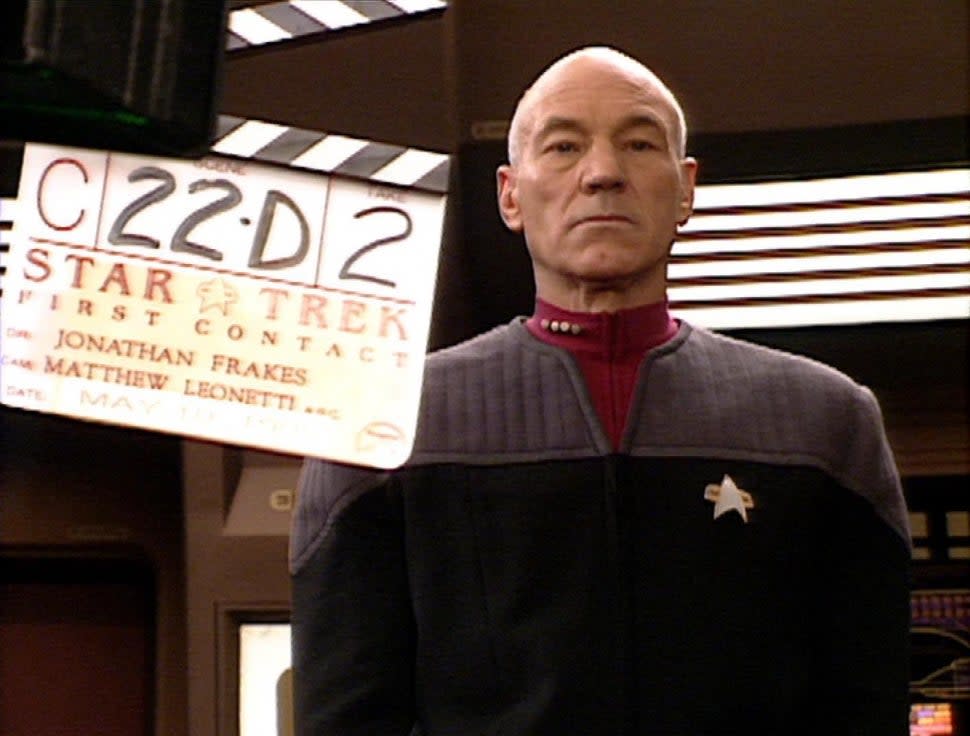 Patrick Stewart waits for a scene to begin on the set of 'Star Trek: First Contact.'