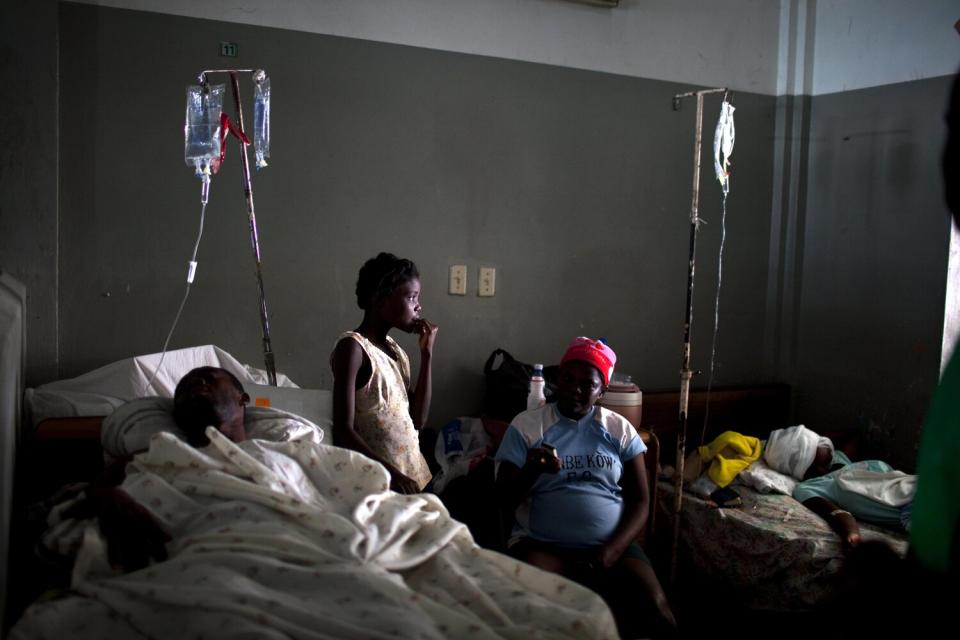 Injured victims of the earthquake receive treatment at the Port-au-Prince general hospital.