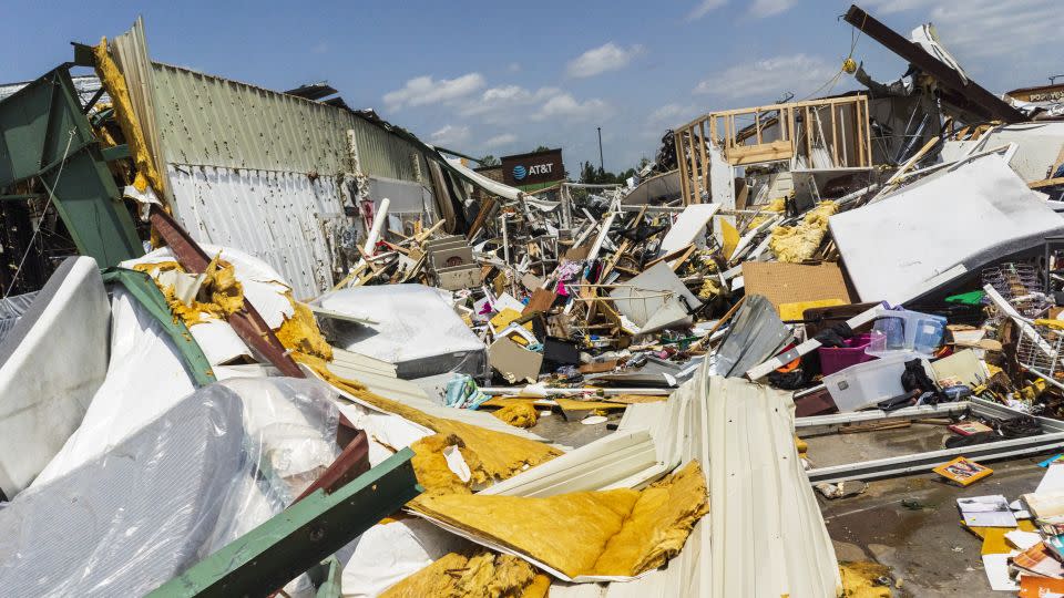 The Home Town Flea Market was severely damaged in Rogers, Arkansas. - Charlie Kaijo/The Northwest Arkansas Democrat-Gazette/AP