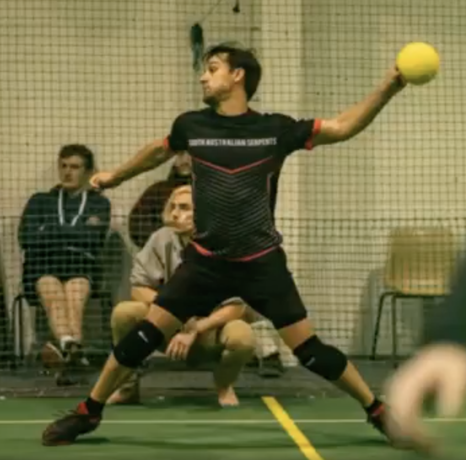 Dion Hallion throws a ball during an Adelaide dodgeball game.