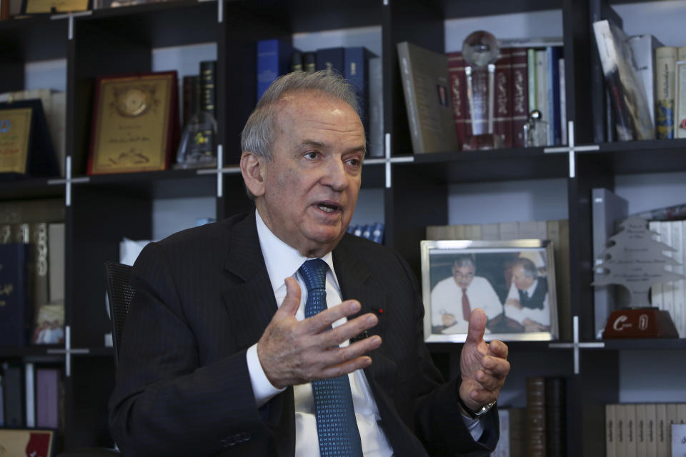 FILE - In this picture taken on Wednesday, Feb. 4, 2015, Marwan Hamadeh, a leading Lebanese legislator and former Cabinet minister who was close to Hariri, speaks during an interview in Beirut, Lebanon. The Special Tribunal for Lebanon, a U.N.-backed court based in the Netherlands, on Monday, Sept. 16, 2019, filed new charges including terrorism and intentional homicide against Salim Jamil Ayyash, a Hezbollah fighter who also is accused of assassinating former Lebanese Prime Minister Rafiq Hariri. The new indictment accuses Ayyash of three bombings on Oct. 1, 2004, June 21 and July 12, 2005, each targeting a different politician — Marwan Hamadeh, Georges Hawi and Elias El-Murr. (AP Photo/Bilal Hussein, File)