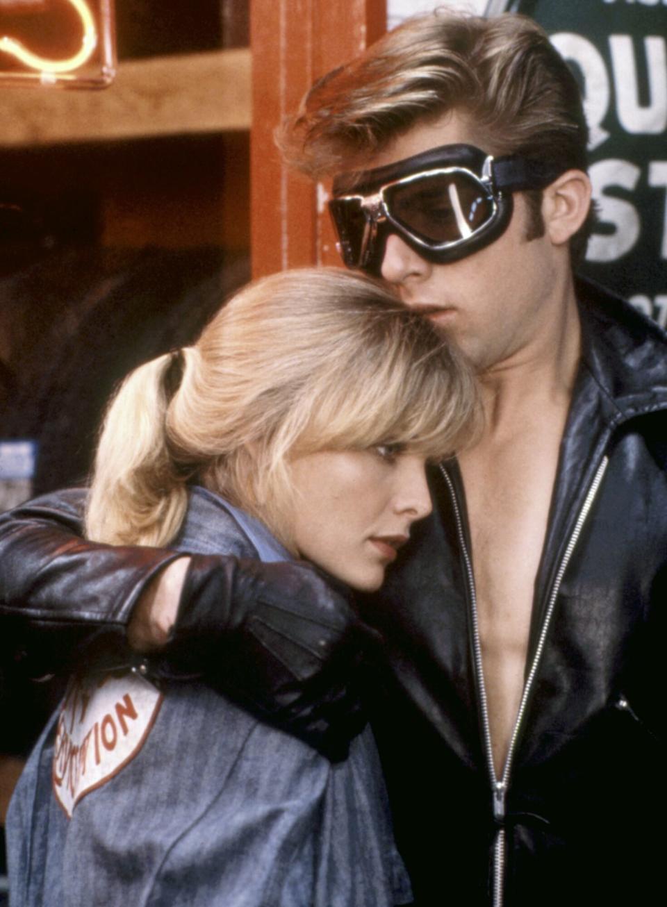 Stephanie (Michelle Pfeiffer) finds comfort in the arms of her Cool Rider (Maxwell Caulfield)in 'Grease 2'