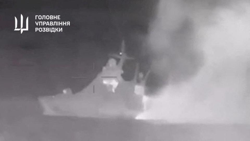 Handout footage shows smoke rising from what Ukrainian military intelligence said is the Russian Black Sea fleet patrol ship ‘Sergey Kotov’, which was damaged by Ukrainian sea drones (via Reuters)