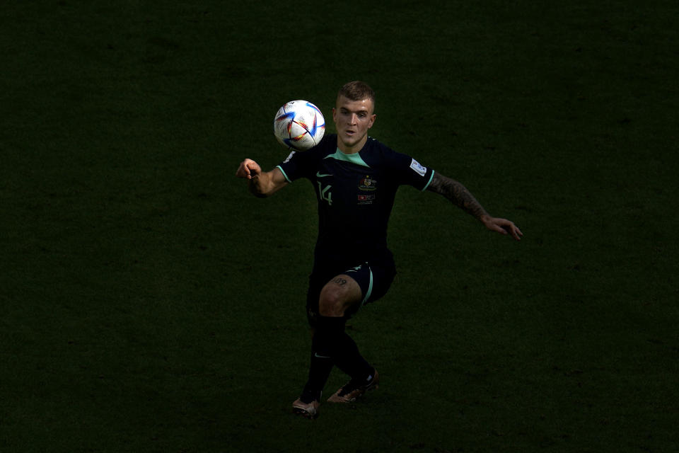 Australia's Riley McGree eyes the ball during the World Cup group D soccer match between Tunisia and Australia at the Al Janoub Stadium in Al Wakrah, Qatar, Saturday, Nov. 26, 2022. (AP Photo/Natacha Pisarenko)