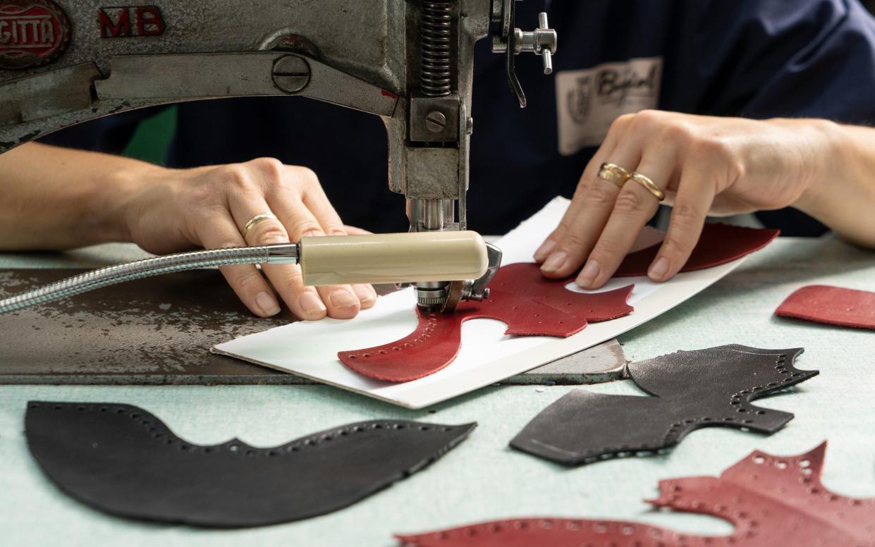 Punching the brogue pattern into leather panels - edoardodelille
