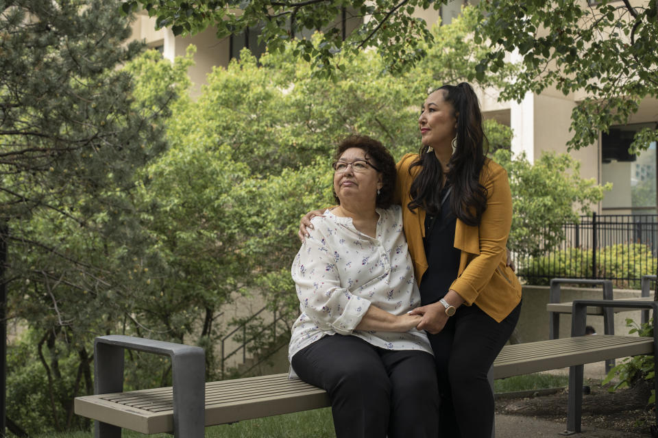 May Sarah Cardinal and her daughter, Anita Cardinal, sit for a portrait outside the Law Courts building in Edmonton, Alberta, Canada on Thursday, May 25, 2023. “My mother had always told me she wanted more children but that she didn’t have a choice,” Anita says. (AP Photo/Amber Bracken)