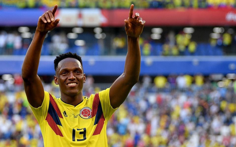 Yerry Mina celebrates after scoring Colombia's winner on Thursday – his second from a set piece at this year's World Cup - FIFA