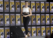 Scarlett Johansson walks on stage during the "Black Widow" portion of the Marvel Studios panel on day three of Comic-Con International on Saturday, July 20, 2019, in San Diego. (Photo by Chris Pizzello/Invision/AP)