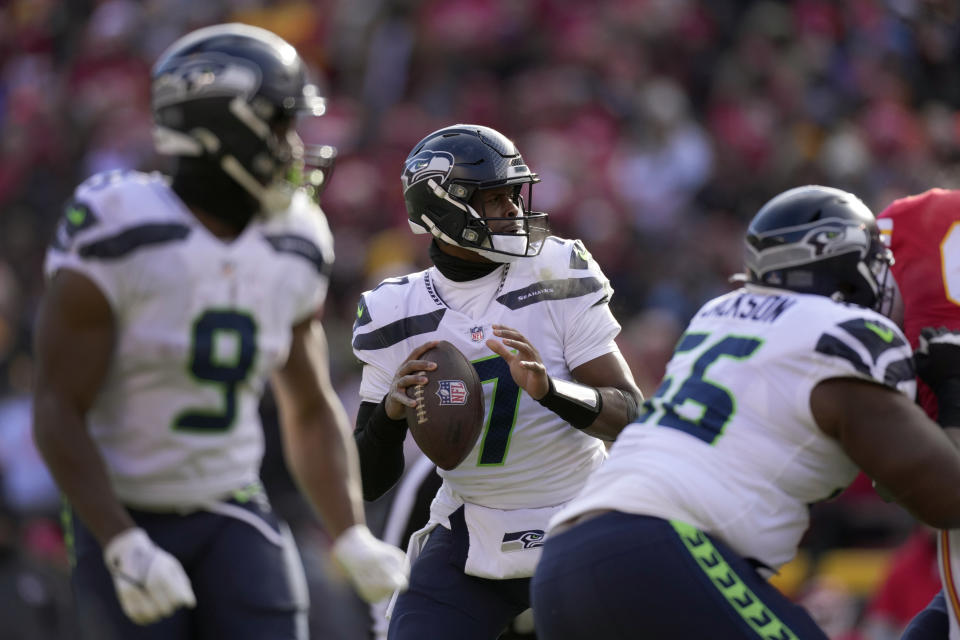 Seattle Seahawks quarterback Geno Smith (7) throws during the first half of an NFL football game against the Kansas City Chiefs Saturday, Dec. 24, 2022, in Kansas City, Mo. (AP Photo/Charlie Riedel)