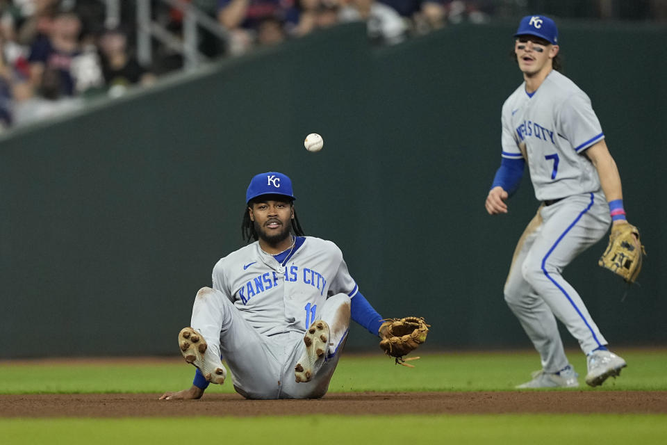Kansas City Royals third baseman Maikel Garcia (11) loses the ball while trying to field a single by Houston Astros' Jose Altuve during the seventh inning of a baseball game Friday, Sept. 22, 2023, in Houston. (AP Photo/David J. Phillip)