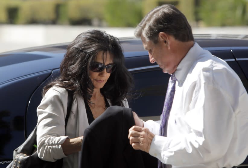 Britney Spears parents, Lynne Spears, left, and Jamie Spears arrive at court Friday Oct. 19, 2012 in Los Angeles. Jurors have been selected to hear a case against Britney Spears' parents that will focus heavily on events that led up to her public breakdown. (AP Photo/Nick Ut)