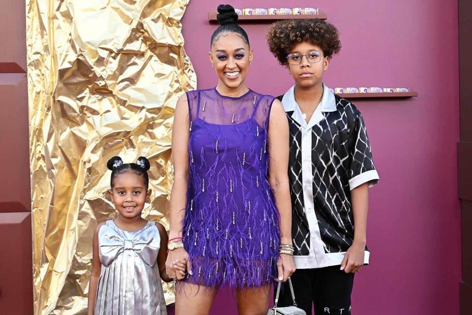 <p>Axelle/Bauer-Griffin/FilmMagic</p> Tia Mowry with daughter Cairo and son Cree in December 2023