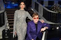 <p>Dua Lipa leans on Sir Elton John on Sunday night during the 29th Annual Elton John AIDS Foundation Academy Awards Viewing Party in L.A.</p>