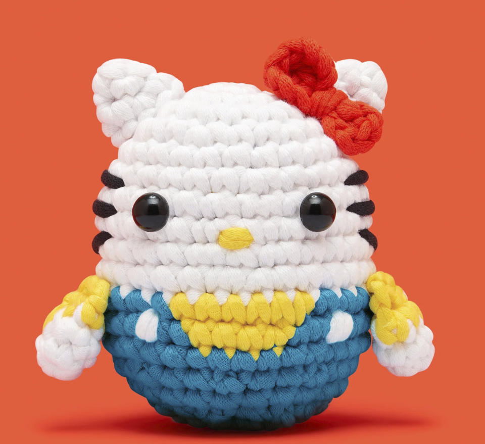 This product image released by The Woobles/The Toy Insider shows a crochet craft project featuring Sanrio’s Hello Kitty character. (The Woobles/The Toy Insider via AP)