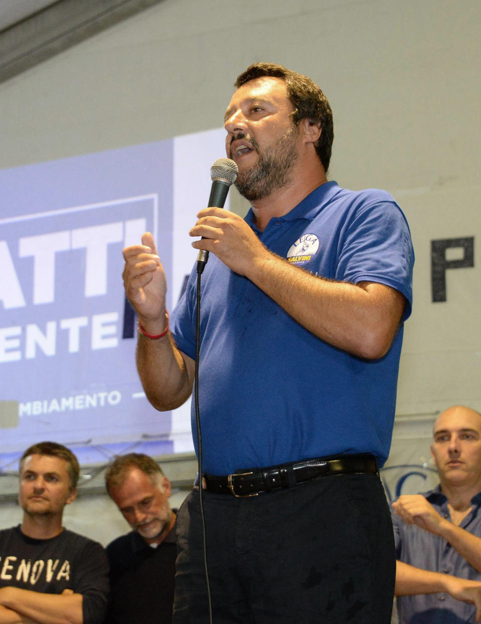 Italian Deputy Premier and Interior Minister, Matteo Salvini, speaks at a Lega party's meeting in Pinzolo, Italy, Saturday, Aug. 25, 2018. Italian state TV says Italy's interior minister is being investigated for his role in forbidding migrants rescued at sea to disembark. Minister Matteo Salvini indirectly confirmed the report Saturday, tweeting that a Sicilian prosecutor asked him for his data and that "if he wants to interrogate me or even arrest me because I defend the borders and security of my country, I'm proud." But Salvini said he'll soon allow the migrants he had kept on an Italian coast guard ship for days to leave. (Daniele Panato/ANSA via AP)
