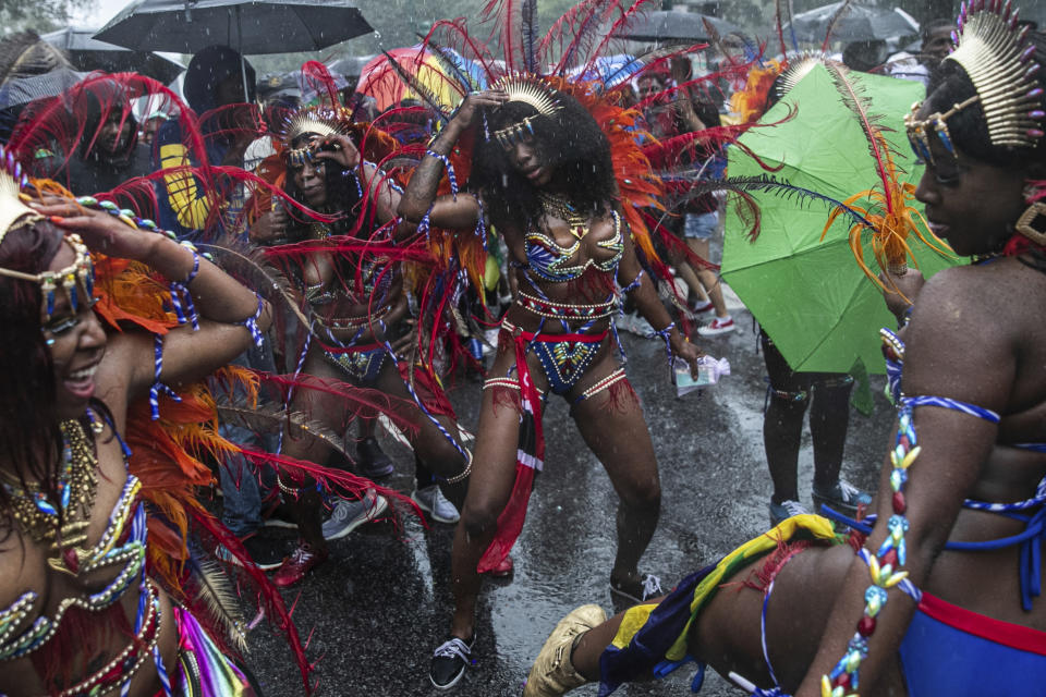 Revelers participate in the West Indian American Day Parade in the Brooklyn borough of New York, Monday, Sept. 2, 2019. The annual parade in Brooklyn is one of the nation’s largest celebrations of Caribbean heritage, a New York take on Carnival celebrations. (AP Photo/Jeenah Moon)