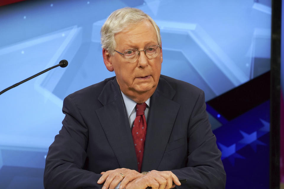 Senate Majority Leader Mitch McConnell, R-Ky., speaks during a debate with Democratic challenger Amy McGrath in Lexington, Ky., Monday, Oct. 12, 2020. (Michael Clubb/The Kentucky Kernel via AP, Pool)