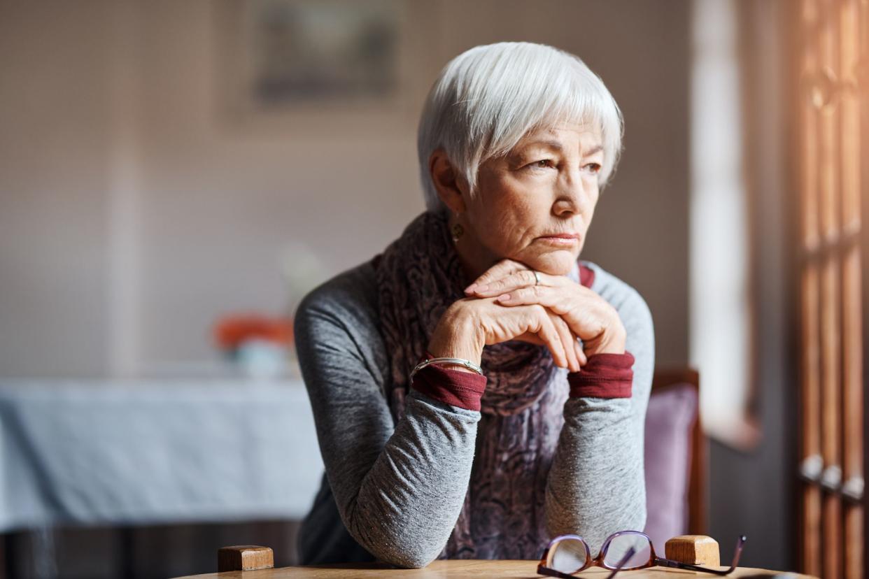 Shot of a senior woman looking thoughtful in a retirement home