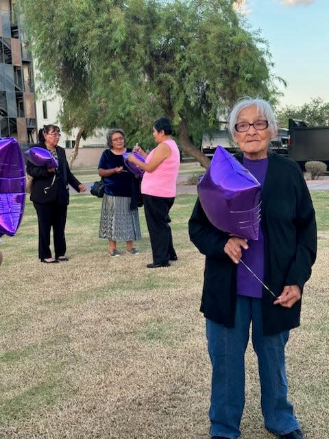 The family of murder victim Jamie Yazzie celebrated her birthday on Sept. 13, 2023, in Phoenix by releasing purple balloons. Jamie’s grandmother, Mary James, holds one of the balloons.