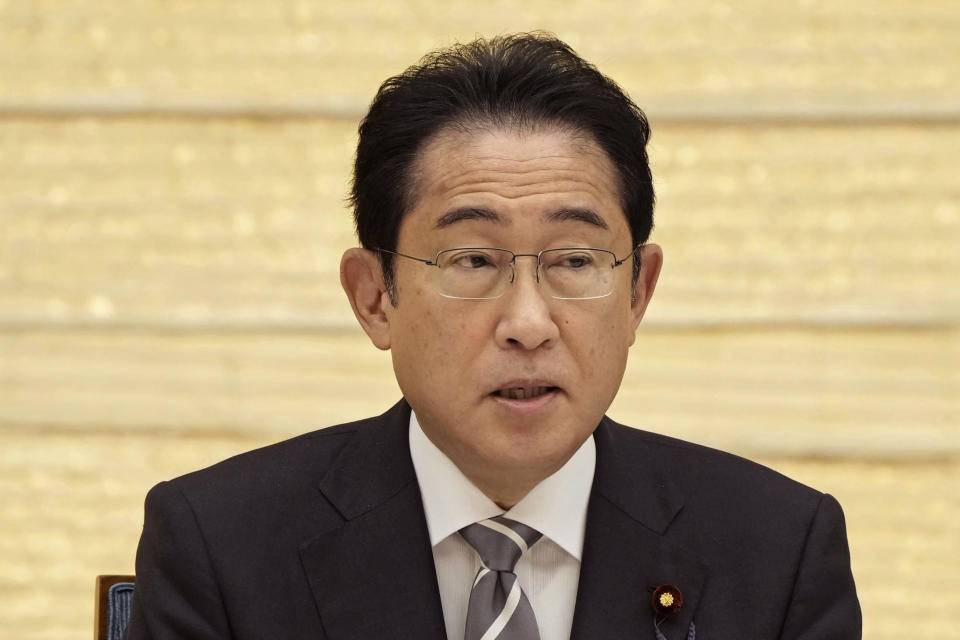 Japan's Prime Minister Fumio Kishida speaks at a meeting in Tokyo Friday, April 14, 2023. Japan’s government on Friday approved a controversial plan to open its first casino in Osaka as the country of shrinking population seeks to lure foreign tourists. (Kyodo News via AP)