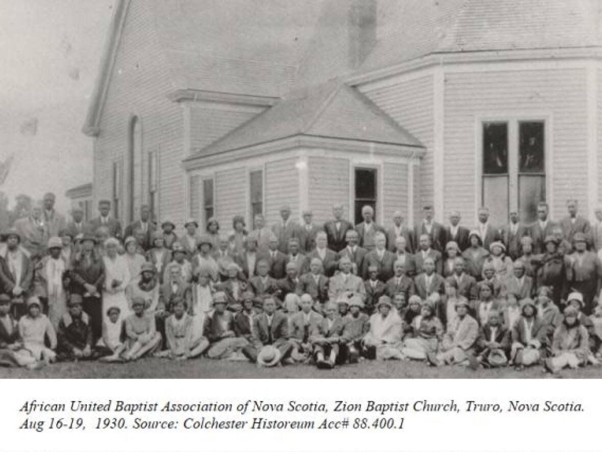 An archived photo from the Colchester Historeum shows the African United Baptist Association in front of the Zion Baptist Church in 1930. (Submitted by Colchester Historeum - image credit)