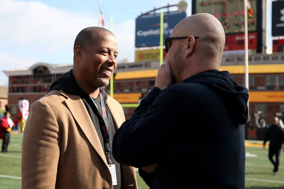 COLLEGE PARK, MD - NOVEMBER 17: University of Maryland athletic director Damon Evans and interim head coach Matt Canada of the Maryland Terrapins speak prior to the game against the Ohio State Buckeyes at Capital One Field on November 17, 2018 in College Park, Maryland. (Photo by Will Newton/Getty Images)