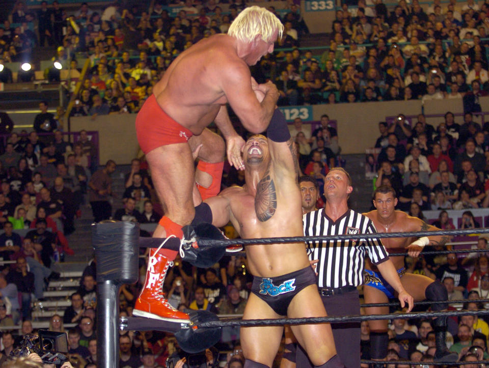 <p>Nature Boy Ric Flair (left) and The Rock during Wrestle Mania XX at Madison Square Garden in New York City, New York, United States. (Photo by KMazur/WireImage) </p>